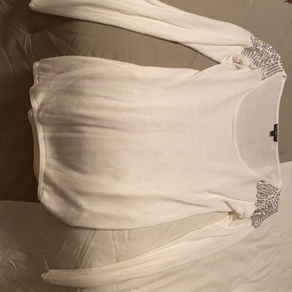 Express sweater s with embellishments